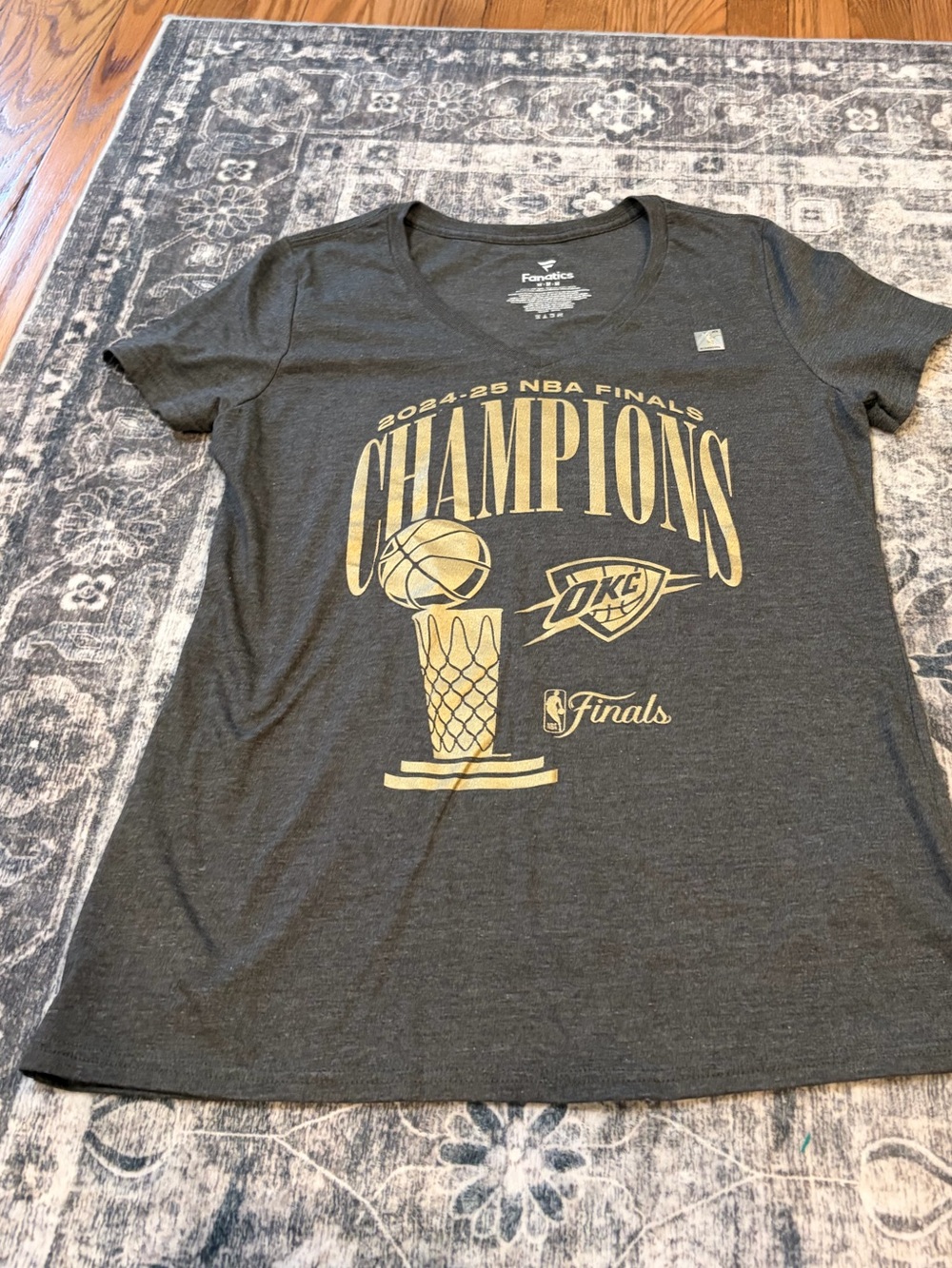 Fanatics Gray Short Sleeve "Champions" NBA Finals Tee with Gold Print